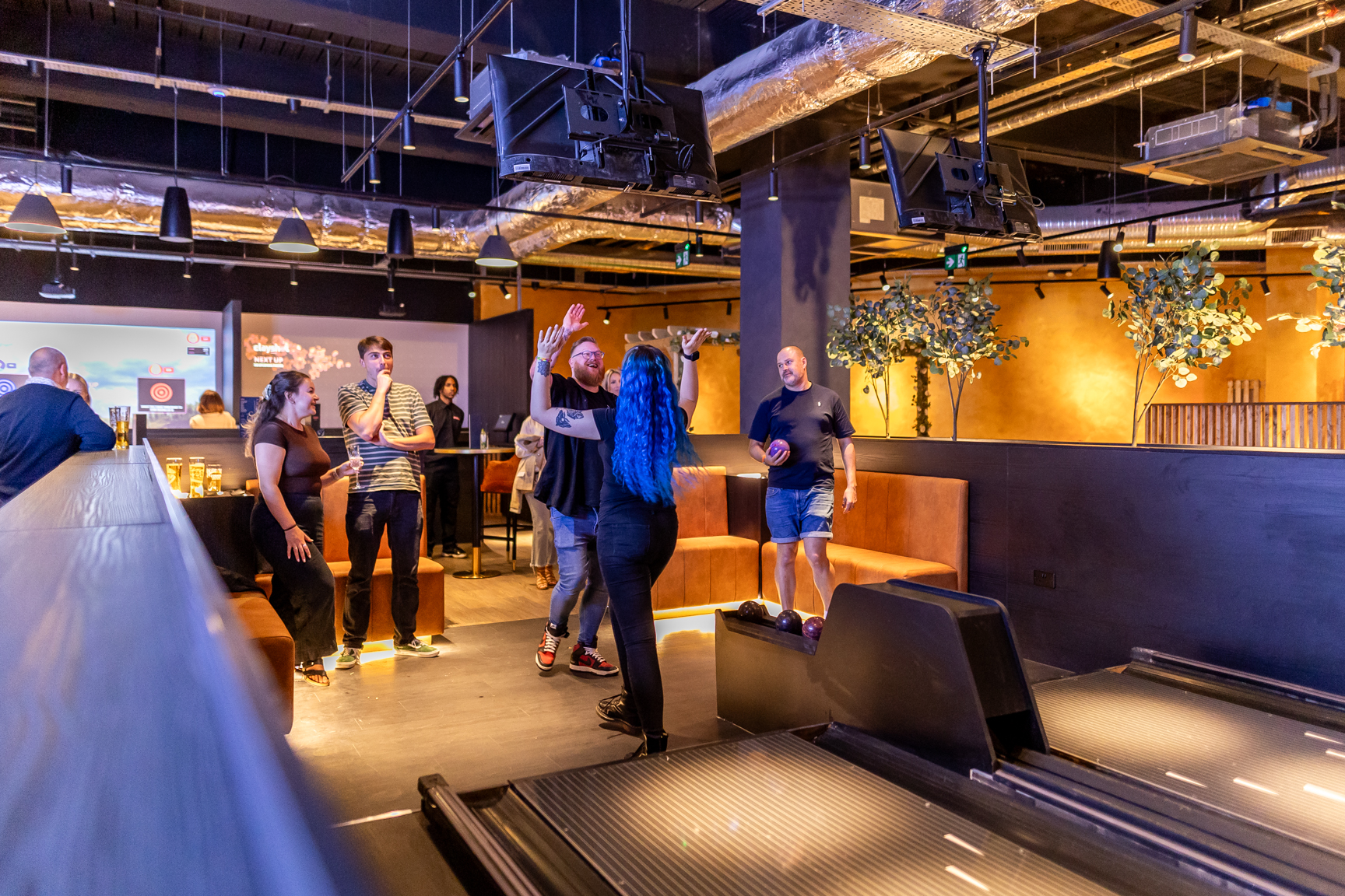 A group playing games together at Spinners